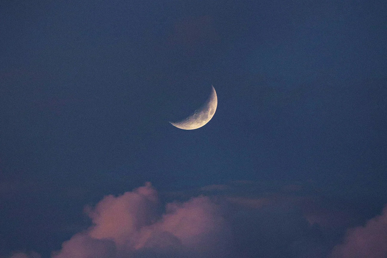 crescent moon in night sky, how to create bedtime rituals for deep sleep and nervous system reset